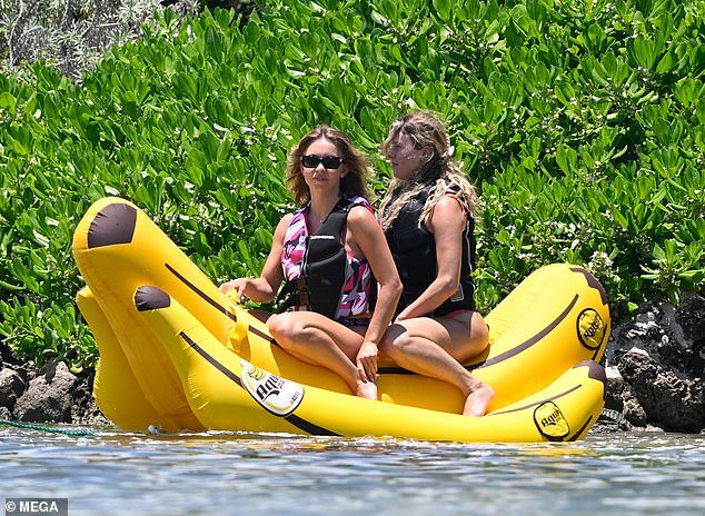 After zooming about on the water, Sydney and her pal then took a giant inflatable banana for a ride