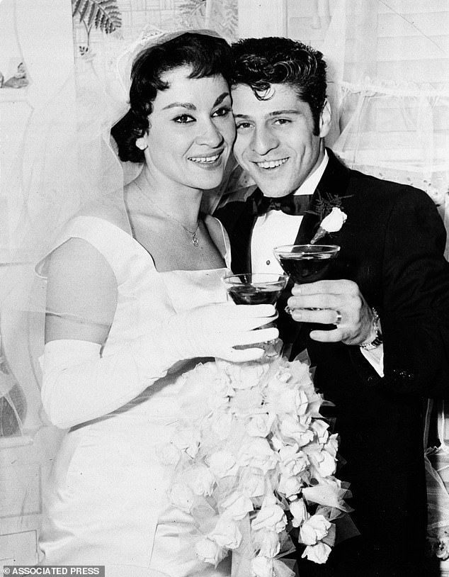 Tony is pictured with wife Chita on their wedding day in 1957