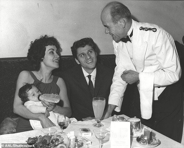 The pair are pictured with their baby daughter Lisa in 1958