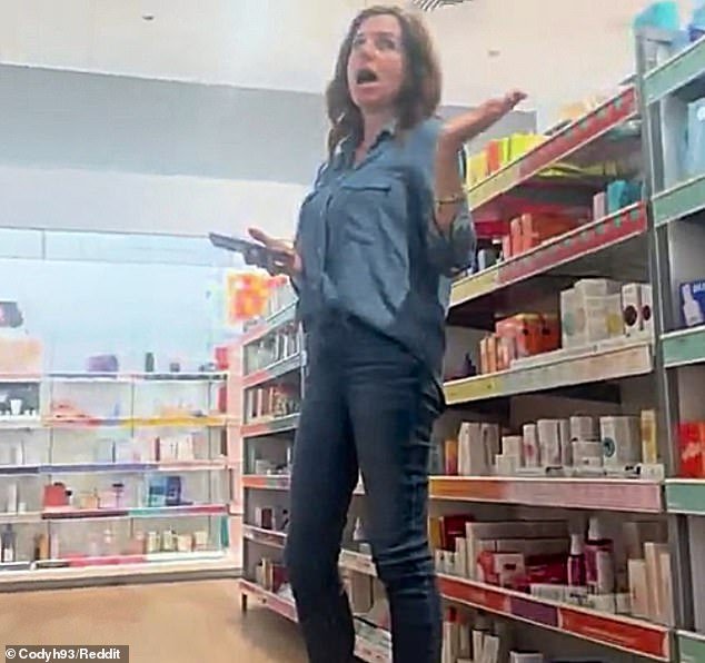 The 47-year-old, dressed in blue skinny jeans, a jean top and heels, pulled out her phone inside the Charleston store, recorded the unnamed man in the middle of the skin care aisle and accused him of 'harassing' her