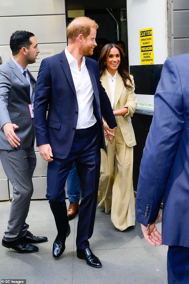 After Meghan's appearance at the event, the couple left via a side door, flanked by security