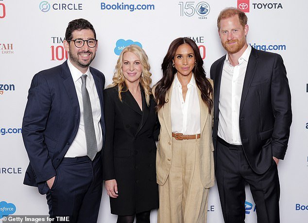 Time edditor-in-chief Sam Jacobs and Time chief executive Jessica Sibley with the couple