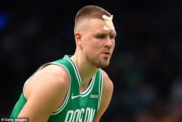He later returned to the court with a massive X-shaped bandaged plaster over his forehead