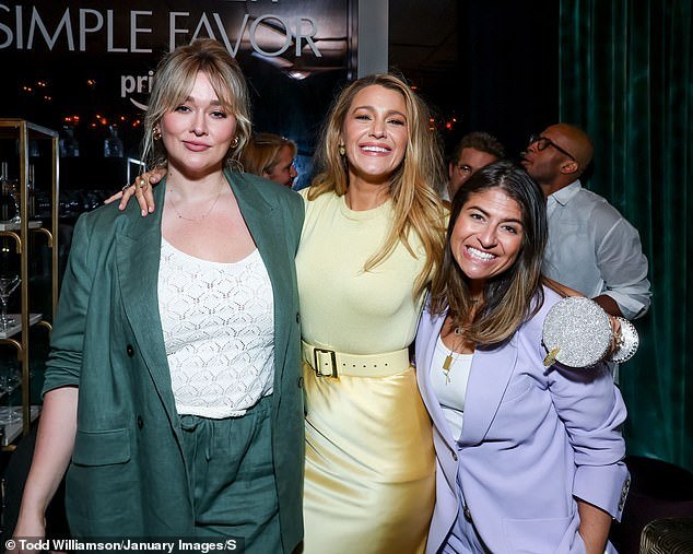 Blake (centre) also toted a martini glass shaped handbag, in a nod to her movie character's favourite drink
