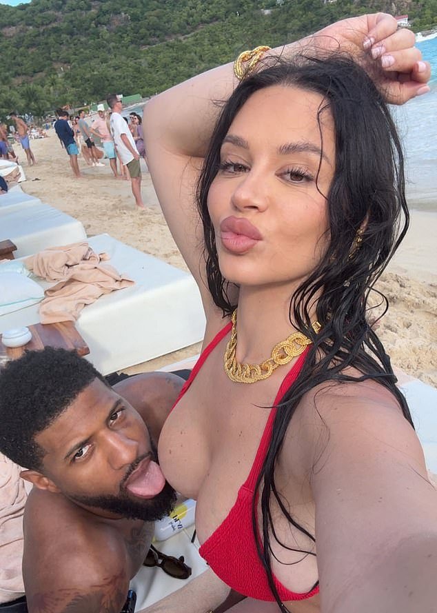 Paul George poses with his wife Daniela during a vacation over the NBA All-Star weekend