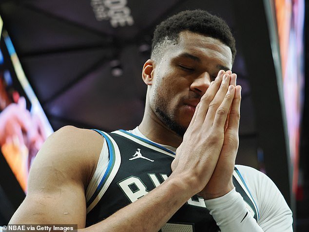 Giannis Antetokounmpo prays before Saturday's playoff opener against the Indiana Pacers
