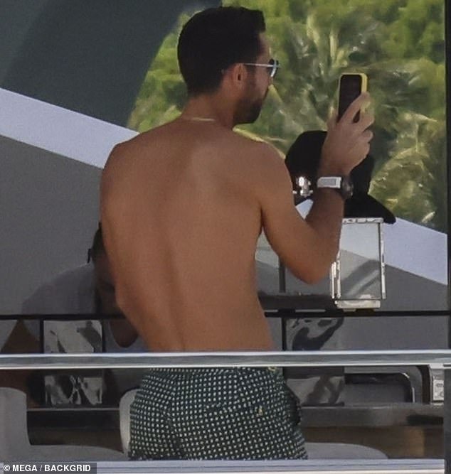 Her dashing husband, a Madrid-born former soccer player, flaunted his sculpted physique, going shirtless during their sun-kissed voyage
