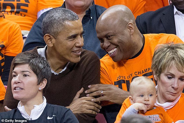 Robinson was particularly impressed that Barack was confident enough to stand on his own two feet and didn't try to suck up to him in an effort to win him over. Pictured: The pair at a basketball game in 2015