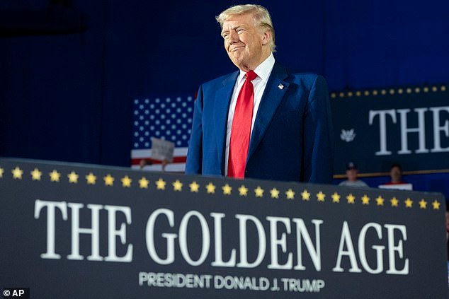 President Donald Trump arrives to speak on his first 100 days at Macomb County Community College Sports Expo Center
