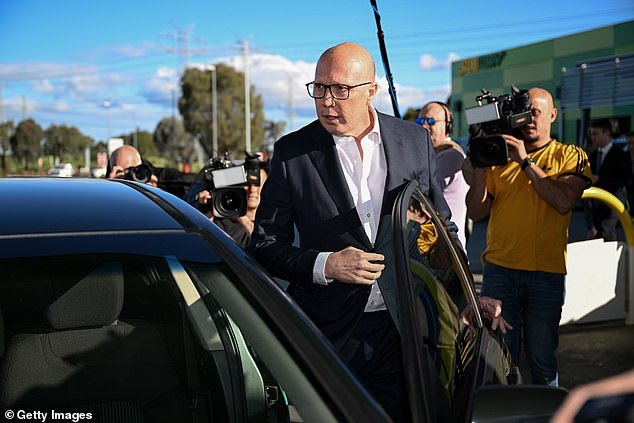 Mr Dutton (pictured) was spotted without the tie later on Wednesday during a visit to a petrol station