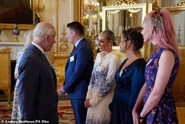 King Charles speaks with ballroom dancer Amy Dowden, actress and broadcaster Giovanna Fletcher and Maren Sheldon, co-founder of CoppaFeel