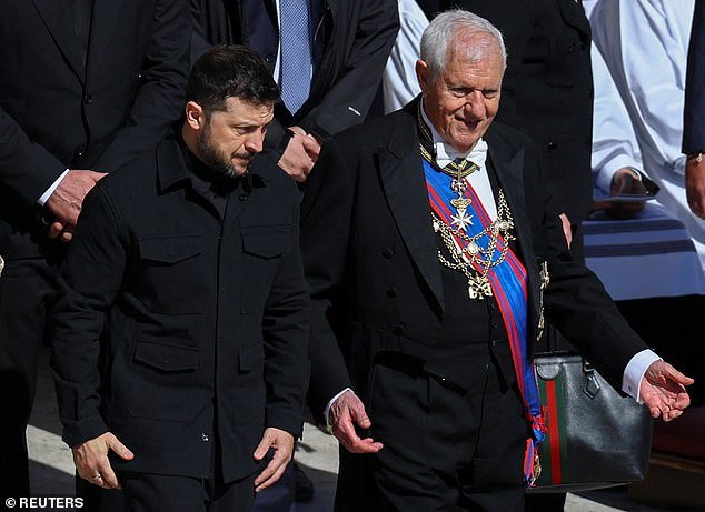 Ukraine's President Volodymyr Zelenskiy walks to attend the funeral Mass of Pope Francis