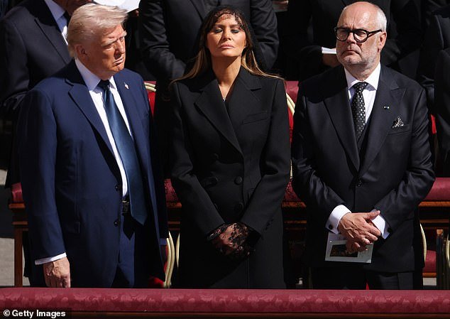 Melania Trump is mourning the 'People's Pope' on her 55th birthday as the First Lady of the US was comforted by her husband Donald Trump in a rare display of affecton