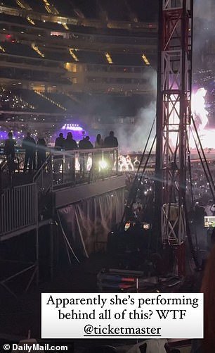 It was impossible to see Beyonce performing from behind the big black box and scaffolding that blocked my section