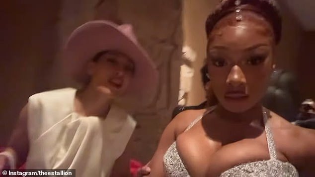 The rapper acknowledged that Met Gala attendees are 'not supposed to have our phones,' to which Tracee Ellis Ross replied: 'Yeah, put your phone away'
