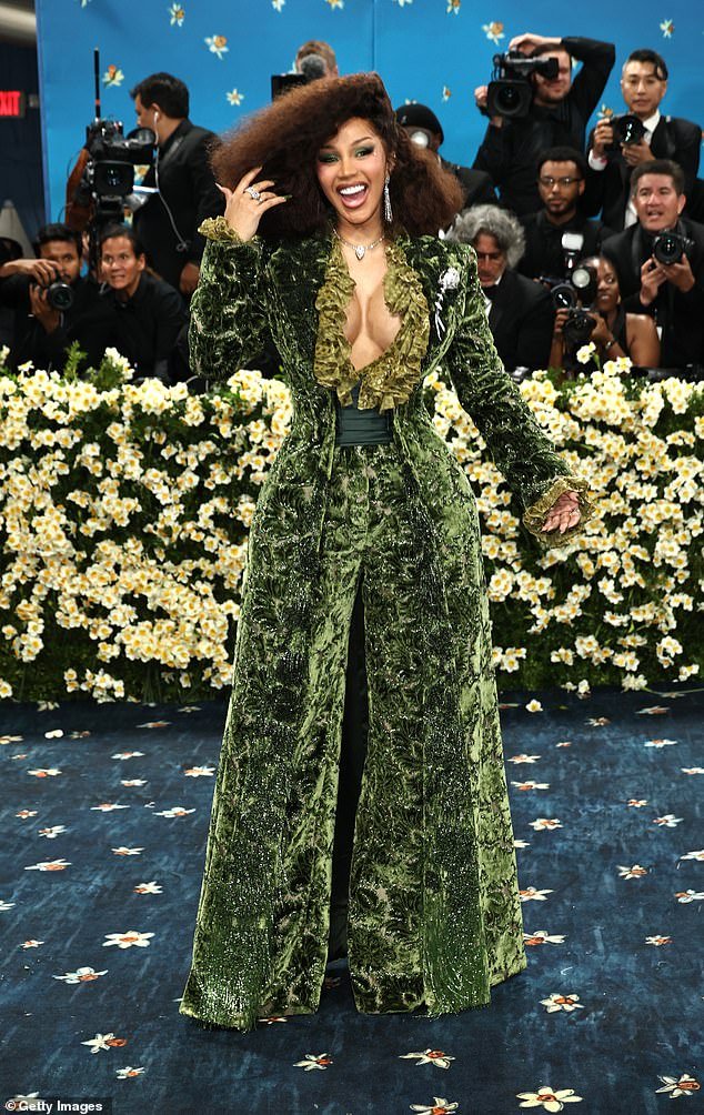 Rapper Cardi B, 32, looked stunning last night in a bright green Victorian-inspired outfit at the 2025 gala