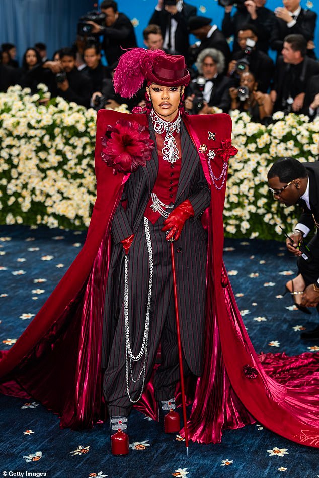 Teyana Taylor made a statement at fashion's biggest event in a pinstriped suit which featured a long satin cape