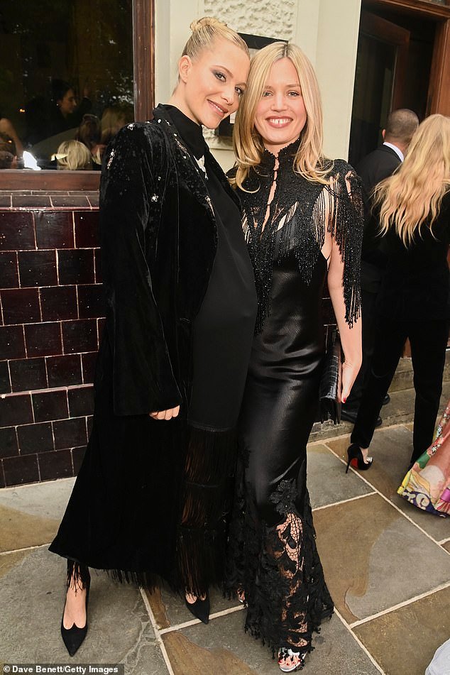 Joining the actress and model at the celebration was her pregnant sister Poppy (L) and pal Georgia May Jagger (R)