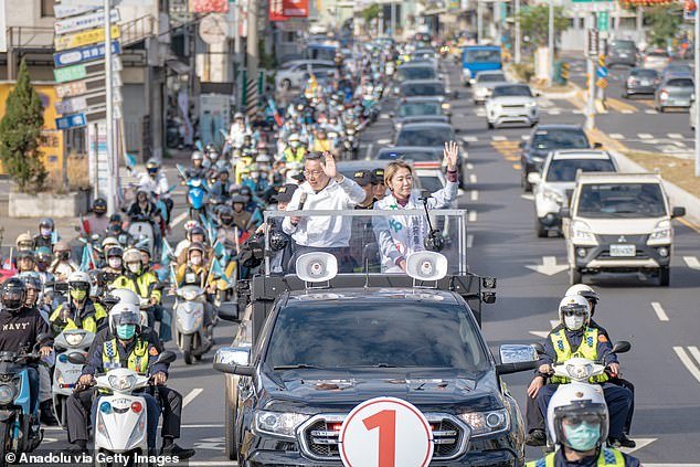 Taiwan People's Party (TPP) presidential candidate, Ko Wen-je, greets supporters during a motorcade campaign tour in Tainan, Taiwan on January 9