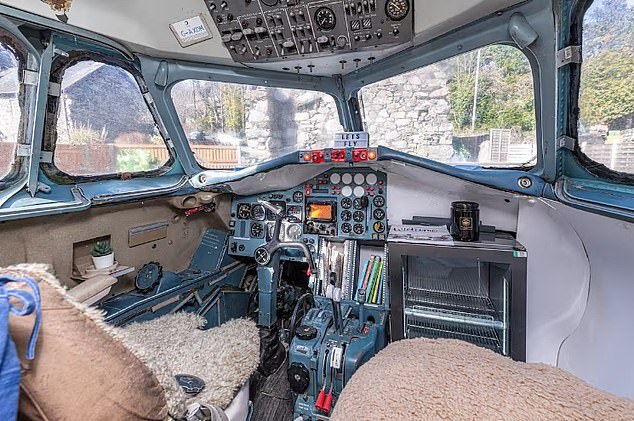 The 1970s private jet, once the property of an oil company, still has its original cockpit in tact for guests checking in at the glamping pod in Dolgellau in Gwynedd, Wales