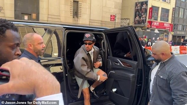 He swung by the event in a fashion forward ensemble including a shirt and tie, worn under another shirt and a sleek jacket and teamed with pale green shorts