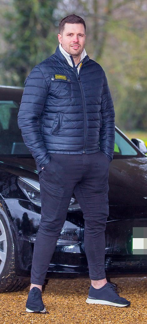 Tom Anderson, 34, drives a Tesla model 3 car