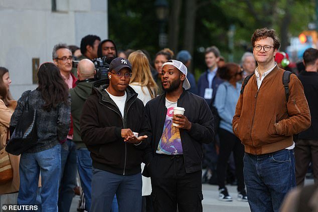 People wait on the first day in the trial of Sean 'Diddy' Combs on sex trafficking and racketeering conspiracy charges at U.S. court in Manhattan, in New York City, U.S., May 12, 2025