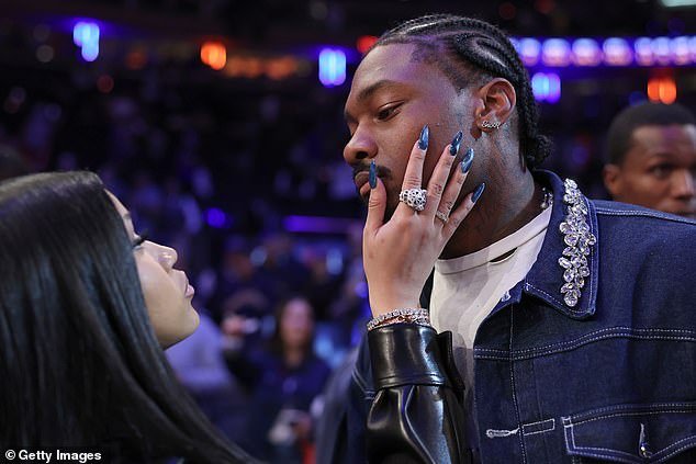 The pair looked loved-up as Cardi caressed Stefon's face with her hand in a very public display of affection