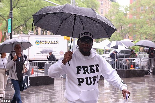 A supporter of Sean 'Diddy' Combs enters a federal courthouse as Combs' trial for sex trafficking, racketeering, and prostitution charges continues in New York, New York, USA, 9 May 2025