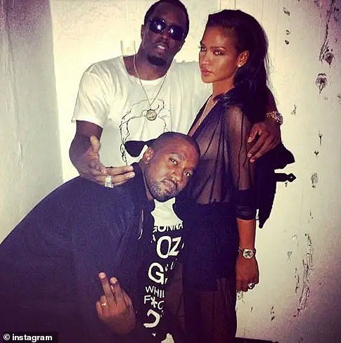 West flashed a peace sign as he stood alongside Diddy and Cassie