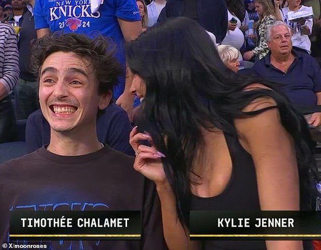 Although he was as glued to the game as ever, Kylie was able to steal his attention for a mischievous chinwag that instantly went viral when it was caught by TV cameras