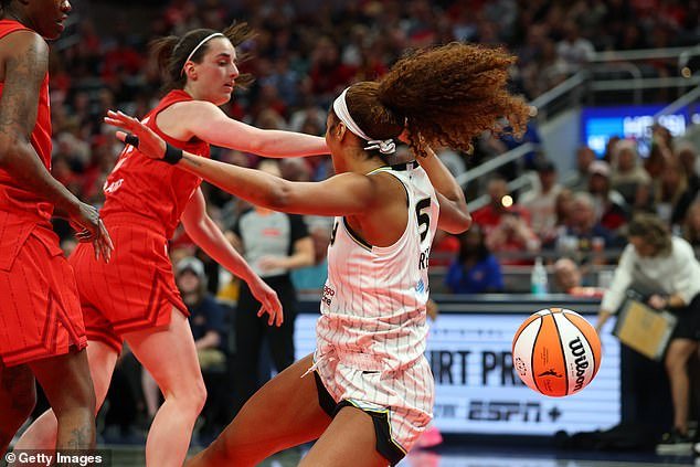 The WNBA launched a racism investigation a day after Angel Reese got into it with Caitlin Clark