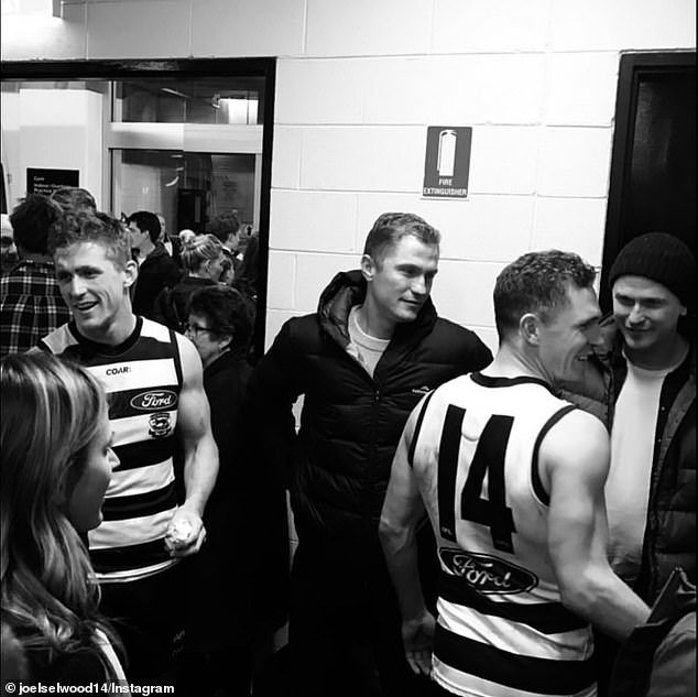 Joel (right, wearing No 14) also posted a picture of he and his brothers Adam (centre) and Scott (left) in the dressing room after a Geelong match