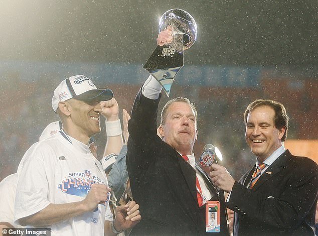 Irsay lifts the Lombardi Trophy after the Colts beat the Chicago Bears in Super Bowl XLI