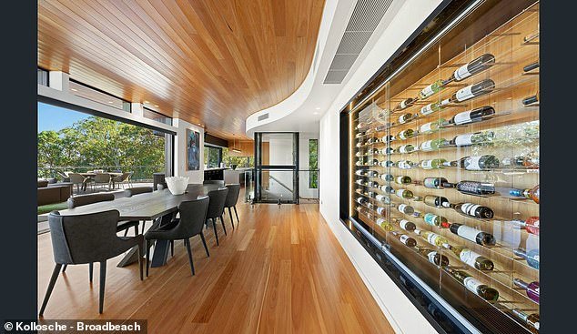 Floor-to-ceiling glass brings in sea breezes, natural light, and expansive views of the Pacific Ocean