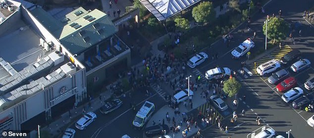 Dozens of emergency vehicles raced to the scene, with a nearby street littered with police cars and ambulances