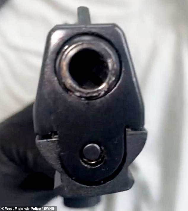 Another clip saw the teenager point the gun at the camera