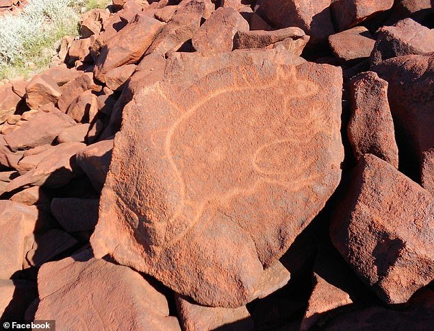 The site features 40,000-year-old rock art (pictured) which is eroding due to acidic emissions travelling in the air from nearby industrial sites, Indigenous elders claim