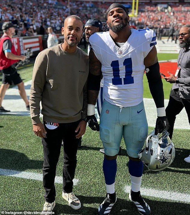 Parsons is seen with his agent David Mulugheta before a game against the Browns