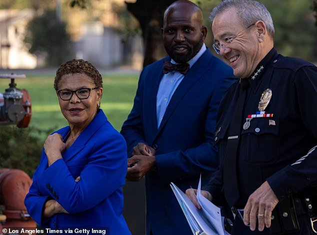 Los Angeles Deputy Mayor of Public Safety Brian K. Williams (center) pleaded guilty to reporting an anti-Israel bomb threat on city hall last year