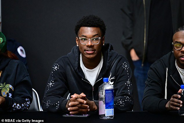 Bryce James watches brother Bronny play for the G League's South Bay Lakers on March 23