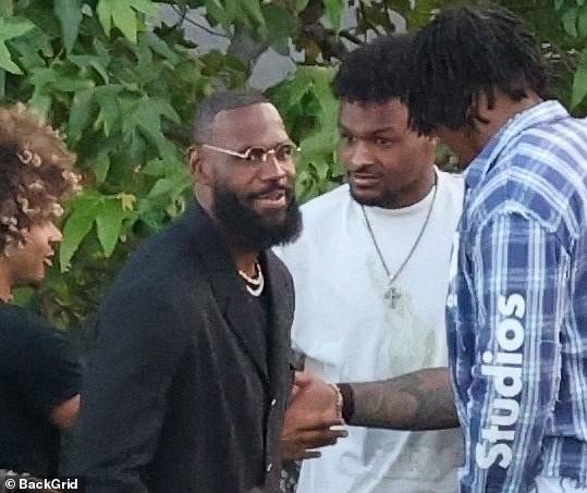 LeBron and Bronny James attend the graduation of 17-year-old Bryce James in California