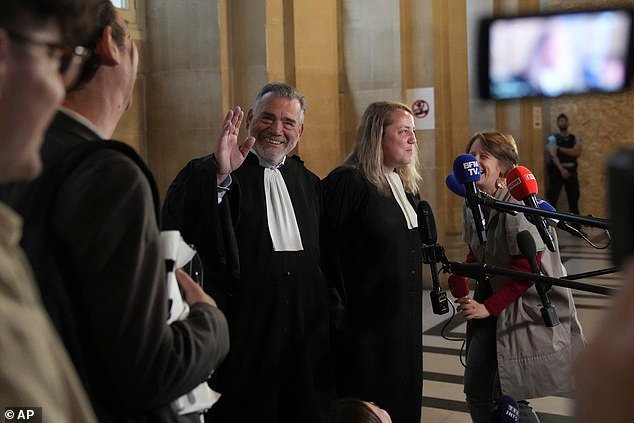 Franck Berton, left, and Chloe Arnaux, lawyers for Khedache, one of the men accused in the 2016 armed robbery of Kim Kardashian, react after the verdict in the trial of Kim Kadashian heist, Friday, May 23, 2025 in Paris