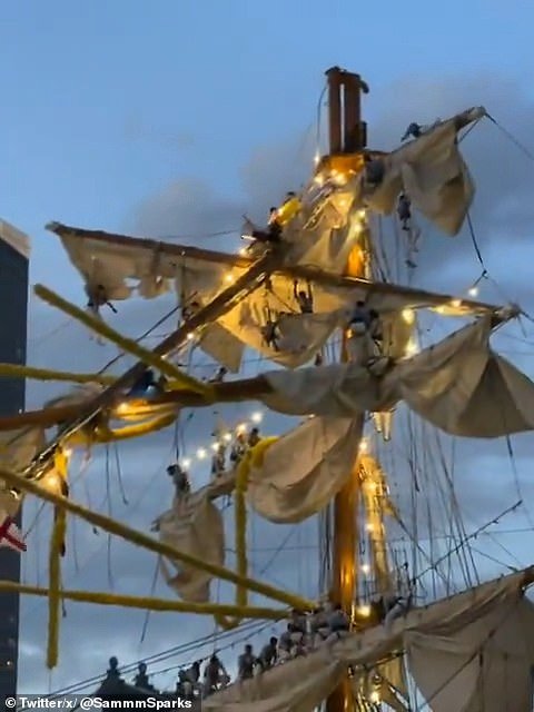 In multiple eyewitness videos, the towering masts are seen snapping and partially collapsing as they crash into the bridge's deck