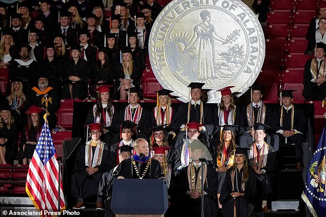 University of Alabama president Stuart Bell speaks before President Donald Trump arrives to give a commencement address at the University of Alabama