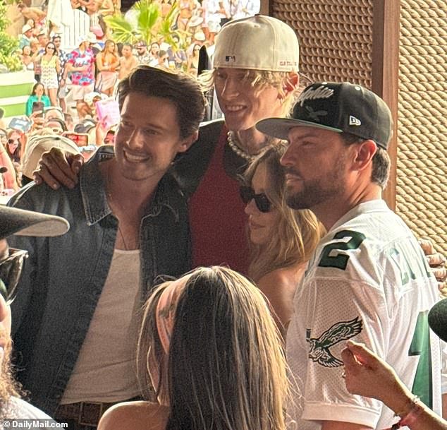 Sydney Sweeney, 27, looked every bit the single blonde bombshell on Saturday as she put on a flirty display with Machine Gun Kelly and Patrick Schwarzenegger at the Palm Tree Beach Club and MGM Grand