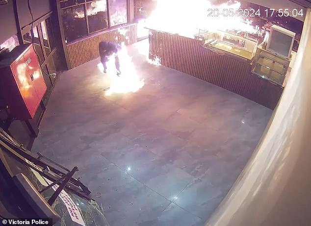 The man was seen dropping to the ground and stumbling as he fought the flames