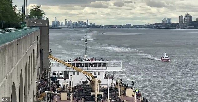 Rescue boats rushed to the area to rescue the man overboard, who was pinned between the boat and the dock