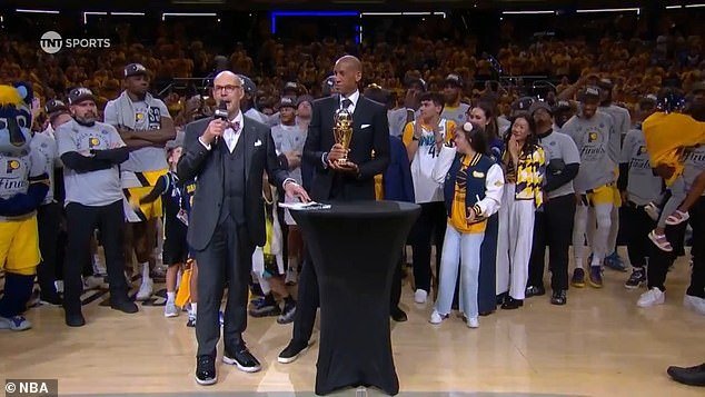 Haliburton (far right) is seen walking in front of teammates as the award winner is revealed