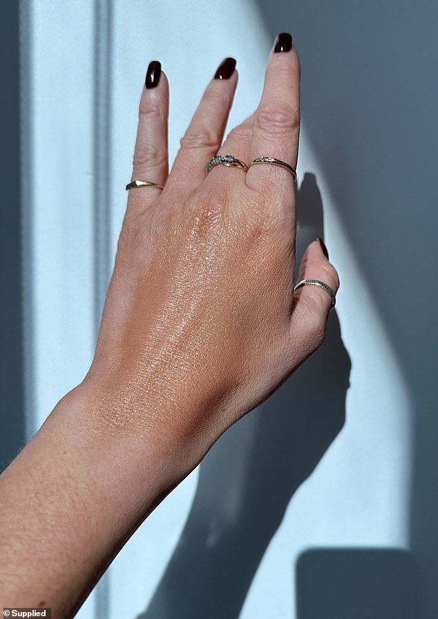 On your more off-duty days, think of these as your primer, bronzer, sunscreen and skin tint in one. Blend a few drops into your daily SPF or layer under makeup for that 'your-skin-but-better' bronze. Pictured: A swatch of Emma Lewisham's new formula